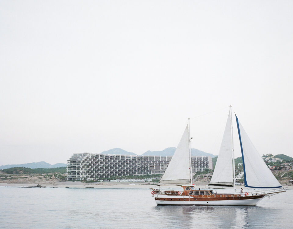 Sailboat wedding experience in front of Grand Velas Los Cabos
